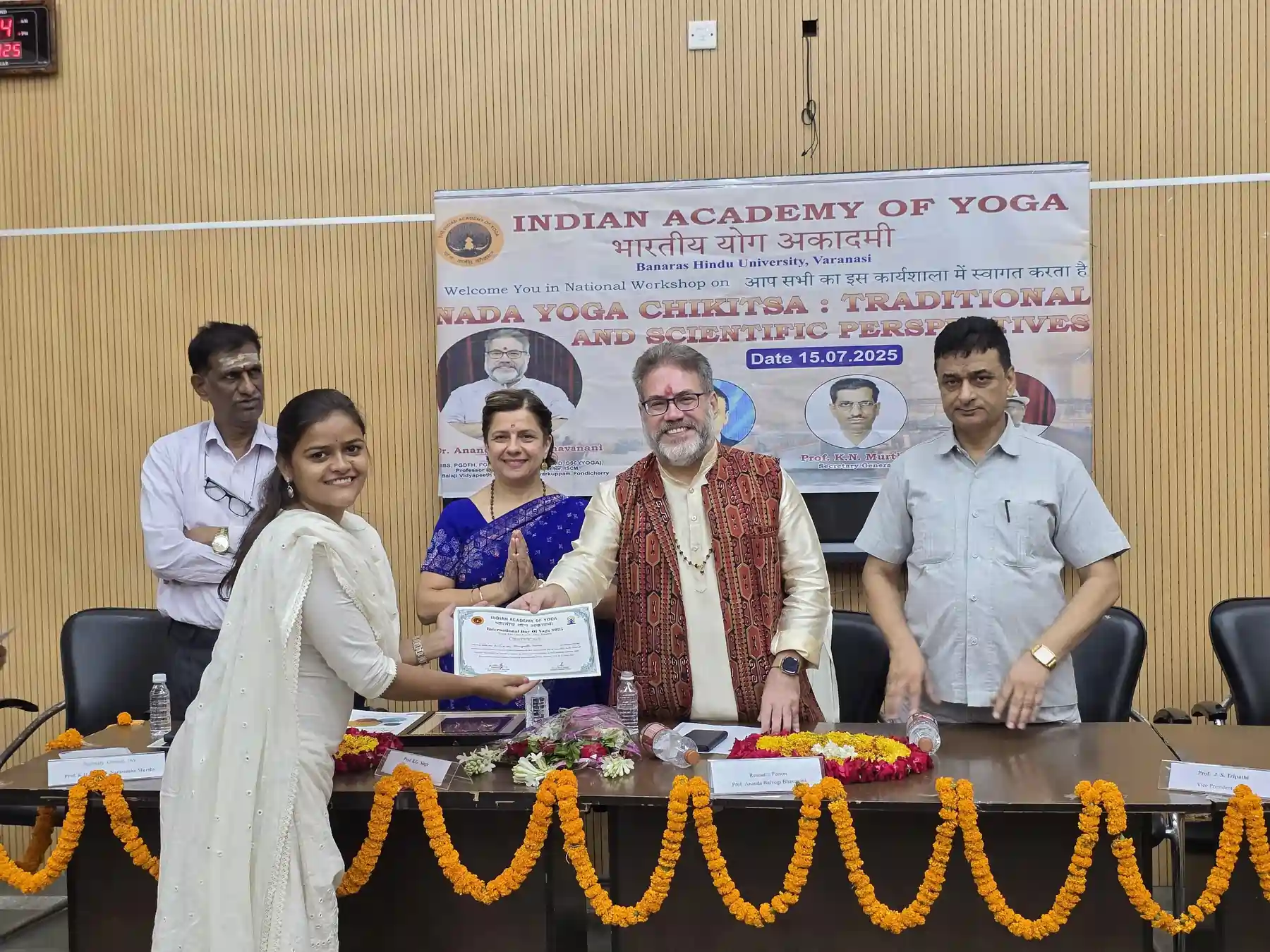 Shringarika Mishra receiving academic excellence certificate